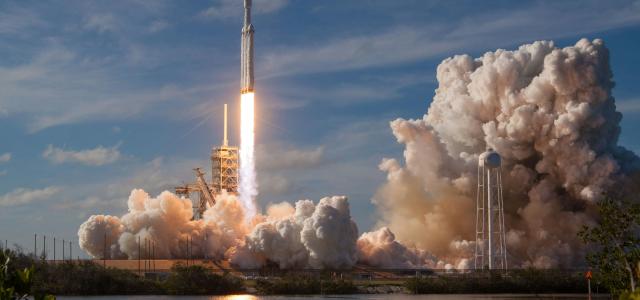 gray spacecraft taking off during daytime by SpaceX courtesy of Unsplash.